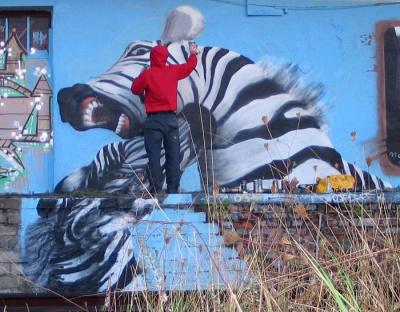 Kamer w trakcie realizacji graffiti