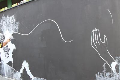 Awer working on mural in Bielsko-Biała