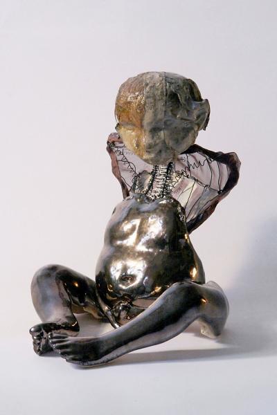 Joanna Żochowska, Buddha, 2012, ceramika, tkanina, metal 30x40x40 cm