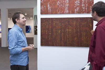 Otwarcie wystawy, Robert Motelski w rozmowie z Rafałem Borczem,  fot. K. Morcinek