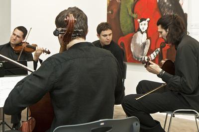 Koncert „Atom String Quartet”. Skład zespołu: Dawid Lubowicz, Mateusz Smoczyński, Michał Zaborski i Krzysztof Lenczowski